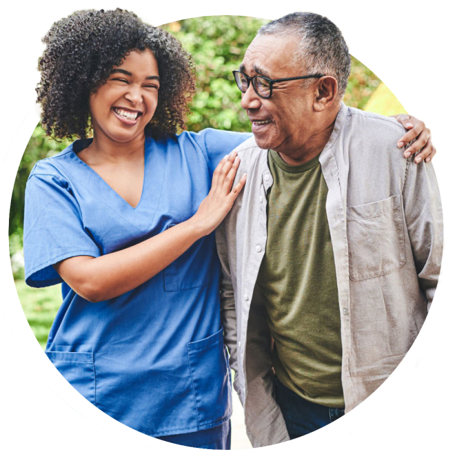 A nurse smiling with a patient